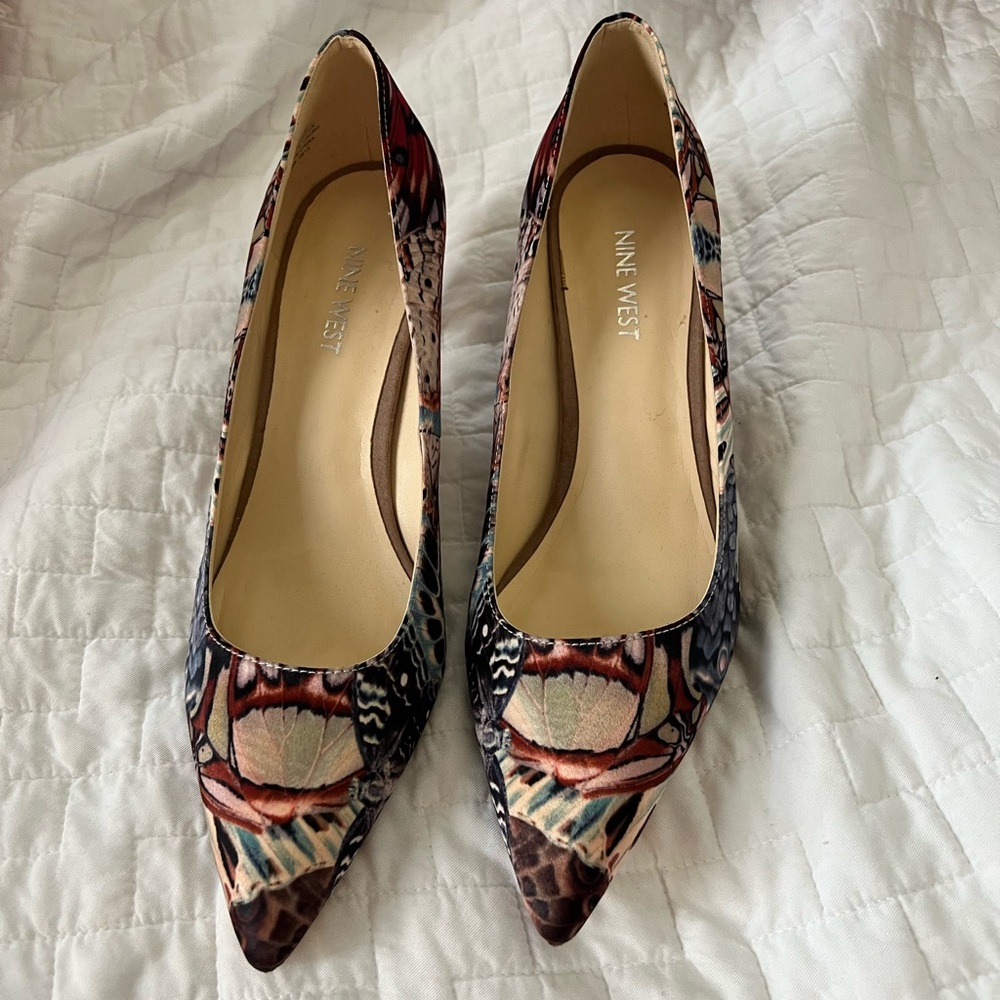 Nine West pumps. Size 8.5. Cool graffiti like print. 2” heel. Pointed toe.